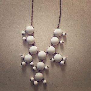 White statement necklace.